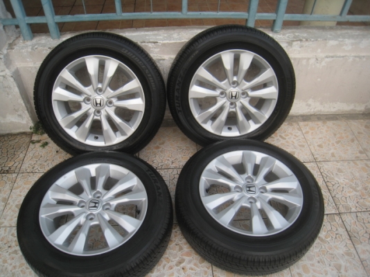 ขายล้อแม็ก city 15" พร้อมยางปี13 สนใจติดต่อเล็กคลองสามครับ 081-3747940