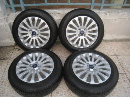 ขายล้อแม็ก ford fiesta 15" พร้อมยางปี13 สนใจติดต่อเล็กคลองสามครับ 081-3747940
