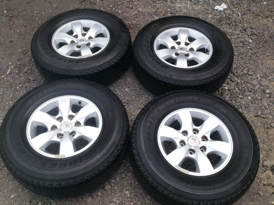 ขายแม็กTOYOTA  VIGO  CHAMP ขอบ16 พร้อมยางบริดสโตน 265/70R16  ยางสัปดาห์ที่28ปี12  ดอกยางนิ่มลึกไม่ร้าวไม่แตกลายดอกเต็ม จำนวน  1  ชุด พร้อมน๊อตแท้ 24  ตัว