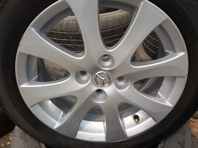 ขายล้อแม็ก Mazda 2 ขอบ15ยาง185/55/15 ปี12  4 ล้อ