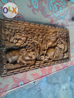งานไม้แกะสลัก เก่าเก็บประมาณ 10 ปี สภาพตามรูปครับ สนใจนำไปประดับบ้านโทรคุยกันนะครับ สูง 30 ยาว 60 ซม
