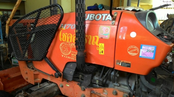 ขายรถไถ KUBOTA   M7040  พร้อมดันหน้าช้าง ผาน 6 ราคา 395,000