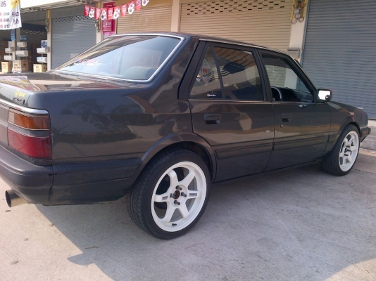 ขาย!!!!!มาสด้าเก๋งแต่ง ของแต่งให้หมด ปี31 รถสีสวยคับ เครื่องยนต์เบ็นซิลประหยัดน้ำมัน พร้อมใช้ ทะเบียน+เอกสารโอน ภาษีหมดไม่หมด 088-2197709