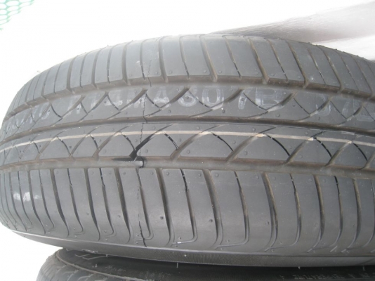 ขายกะทะล้อ Nissan march 14"  4รู 100  +ฝาครอบ+ ยาง ปี 4812 (081-3747940)