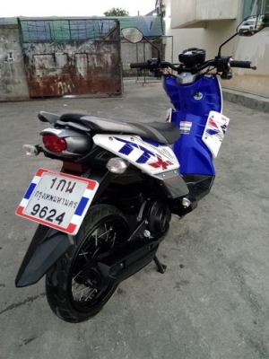 TTX สี ขาว-น้ำเงิน หัวฉีดประหยัดน้ำมัน รถปี56 ครับ