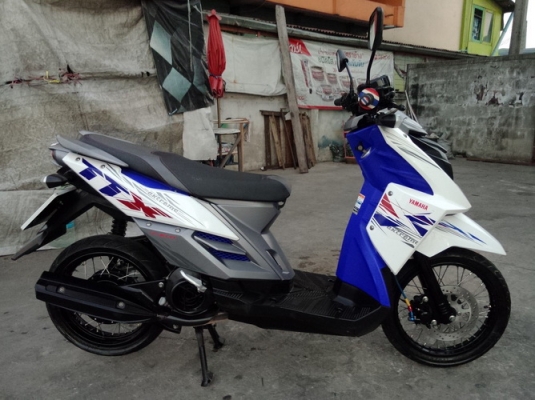 TTX สี ขาว-น้ำเงิน หัวฉีดประหยัดน้ำมัน รถปี56 ครับ