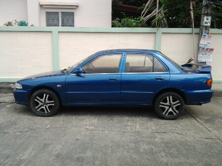 ขายรถยนต์ ปี94 มิตซูบิชิ อีคาร์ เครื่อง1500cc.(ติดแก๊ส) เกียร์ออโต้ พวงมาลัยเพาเวอร์ กระจกไฟฟ้า แอร์ ล้อแม็ก ภายในดี เครื่องดี ขายถูกๆตามสภาพ (ไม่ใช่แท็กซี่100\%)