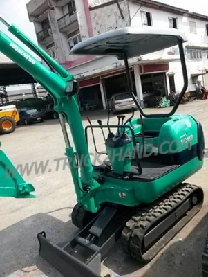 รถแบคโฮ KOMATSU PC15 รุ่น 8   ปี 2004 เป็นรถของห้างหุ้นส่วนจำกัด อิมแพ็ค แมชชินเนอรี่