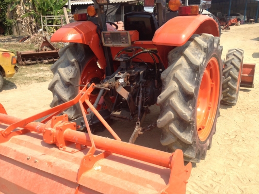 ขายรถ KUBOTA M 6040 สภาพดีพร้อมใช้งานมีอุปกรณ์ครบ3ชิ้นด้นหน้า ผานพรวนและโรตารี่ 2.20เมตร
