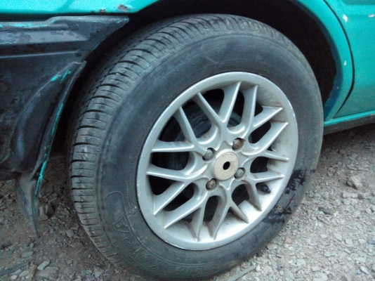 ขายแม็กขอบ14 4รู100พร้อมยางปี12ดอกเยอะ4วง3000