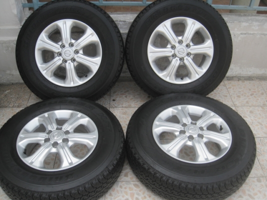 ขายล้อแม็กน้องๆป้ายแดง np300 navara 16"x6" et55 6 รู 114.3 ยาง bridgestone dueler h/t 840 205r16 ยางผลิตสัปดาห์ที่ 35 ปี 2014 ตุ่มที่หน้ายางเห็นลางๆ 2 เส้นครับ สนใจติดต่อเล็กคลองสามครับ 081-3747940