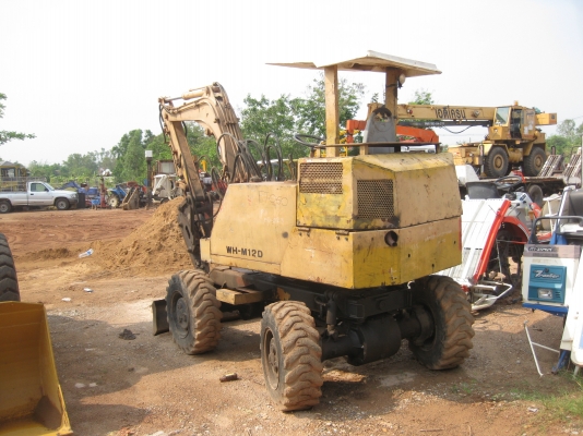 รถแบคโฮล้อยาง ติดหัวเบรกเกอร์