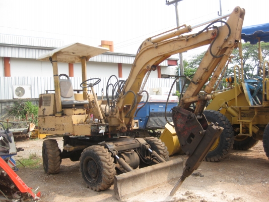 รถแบคโฮล้อยาง ติดหัวเบรกเกอร์