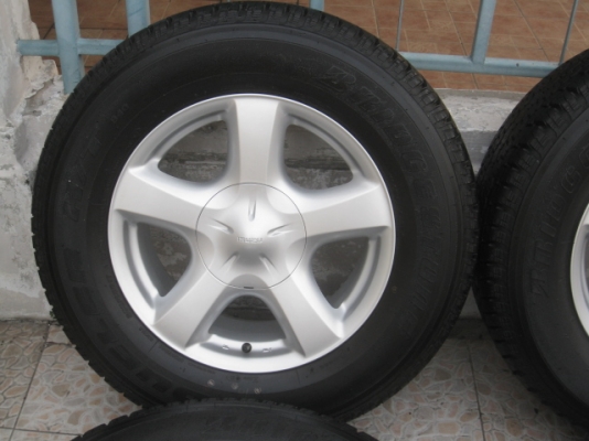 ขายล้อแม็กป้ายแดง dmax 17"x7" et33 6 รู139.7 ยาง bridgestone dueler h/t 840 255/65r17 ยางผลิตสัปดาห์ที่ 31 ปี 2014 ตุ่มที่หน้ายางมีทุกเส้นครับ triton plus, pajero ใส่ได้ครับ ขายทั้งชุด 21,500 บาทครับ สนใจติดต่อเล็กคลองสามครับ 081-3747940