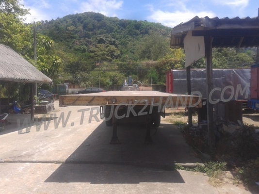 หางพ่วงพื้นเรียบ  ของอู่พนัส  ยาว 9.56  เมตร   กว้าง  2.50 เมตร