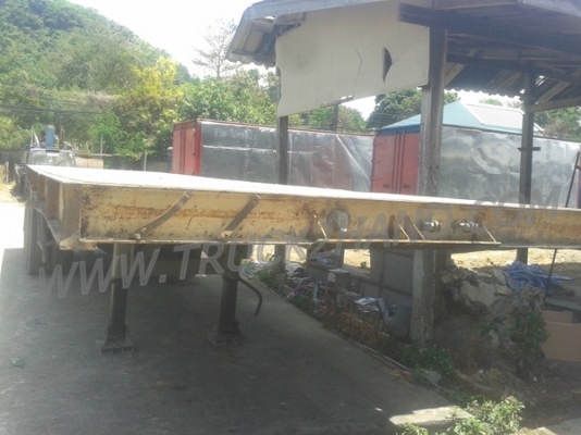 หางพ่วงพื้นเรียบ  ของอู่พนัส  ยาว 9.56  เมตร   กว้าง  2.50 เมตร