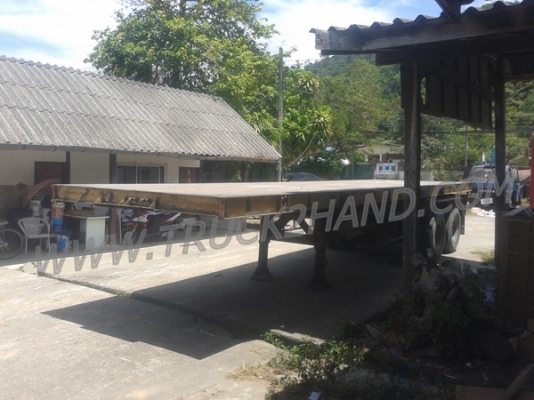 หางพ่วงพื้นเรียบ  ของอู่พนัส  ยาว 9.56  เมตร   กว้าง  2.50 เมตร