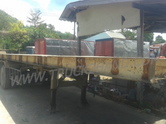 หางพ่วงพื้นเรียบ  ของอู่พนัส  ยาว 9.56  เมตร   กว้าง  2.50 เมตร