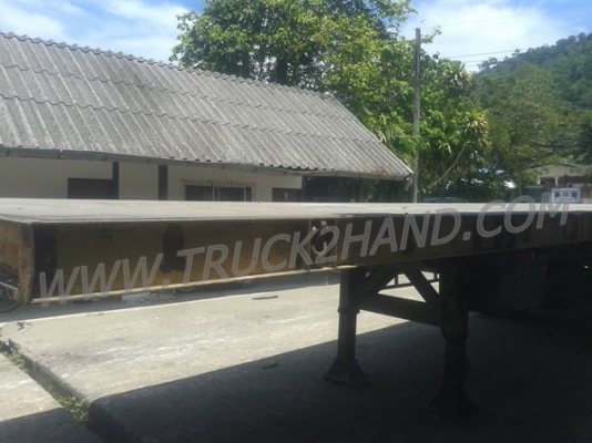 หางพ่วงพื้นเรียบ  ของอู่พนัส  ยาว 9.56  เมตร   กว้าง  2.50 เมตร