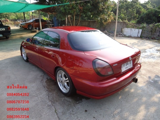 ขาย Mazda lantis สีแดงสวยๆ ติดแก็ส lpg ชุดแต่งรอบคัน ราคา 145,000 บ.+++++++