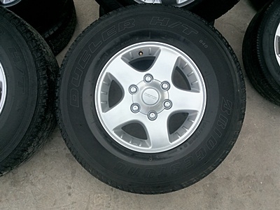 ขายล้อแม็กISUZU ขอบ15 พร้อมยาง255/70/15 4 ล้อ ขายล้อแม็กISUZU ขอบ15 พร้อมยาง255/70/15 4 ล้อ