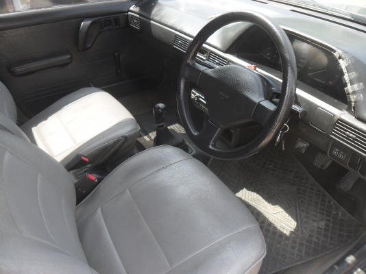 รถมาสด้า 323 1.3 สีเขียว ติดแก๊สลงเล่มแล้ว พร้อมใช้ ราคา 43000 บาท