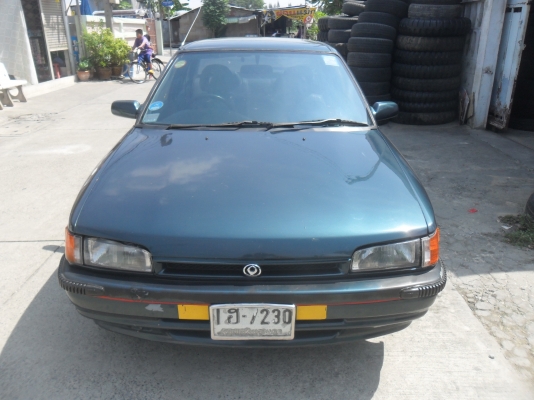 รถมาสด้า 323 1.3 สีเขียว ติดแก๊สลงเล่มแล้ว พร้อมใช้ ราคา 43000 บาท