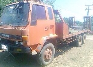 ISUZU ROCKY FXZ 210 HP 6SA1 สิบล้อ 2 เพลา เทรลเลอร์ท้ายลาดมีหางพับไฮดรอลิกส์ขึ้นรถเกี่ยวข้าวและขึ้นรถแบ็คโฮร PC 200 ได้เลยครับ เครื่องแรงดีไม่เยิ้ม หัวเก๋งไม่ผุภายในเก๋งคอนโซลครบพร้อม พวงมาลัยเพาเวอร์ ระบบเบรคทริ๊ปฟี้ครบครัน ช่วงล่างใหญ่คัชซีสวยไม่มีบวม ย