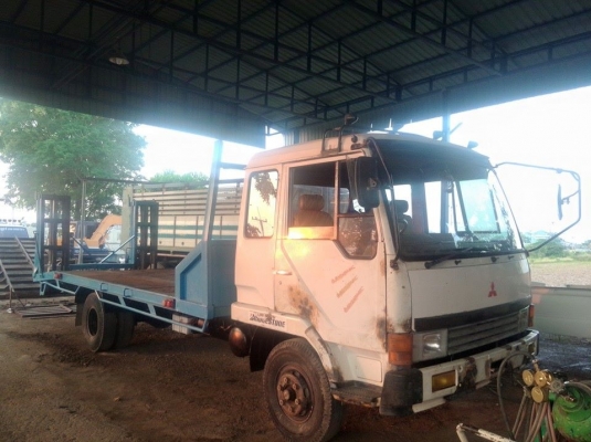 6 ล้อใหญ่ FK415H  เครื่อง 6D14 พวงมาลัยเพราเวอร์  กะบะสายไอบีม กะบะยาว 6 เมตร กว้าง 3 เมตร 36  ยาง 825-16 ภายในสวย สภาพพร้อมใช้  ( หัวกำลังจะทำสีใหม่ )