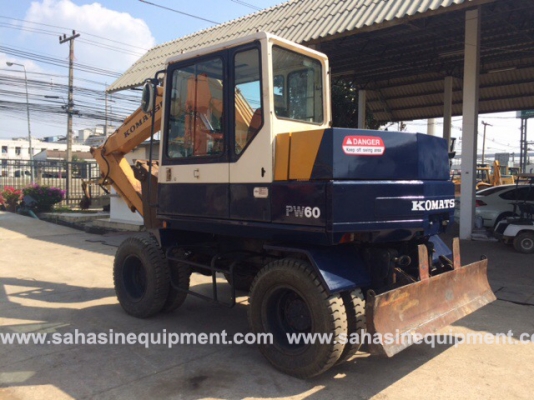รถขุดล้อยาง ยี่ห้อKOMATSU รุ่น PW60-3 S/N 023XX สภาพดี บจก.สหสินอีควิปเม้นท์ โทร.081-5851880, 02-5168100-1 www.sahasinequipment.com รถขุดล้อยาง ยี่ห้อKOMATSU รุ่น PW60-3 S/N 023XX สภาพดี บจก.สหสินอีควิปเม้นท์ โทร.081-5851880, 02-5168100-1 www.sahasinequipment.com