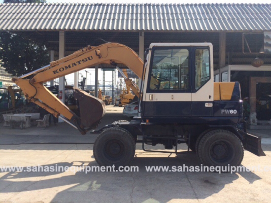 รถขุดล้อยาง ยี่ห้อKOMATSU รุ่น PW60-3 S/N 023XX  สภาพดี บจก.สหสินอีควิปเม้นท์ โทร.081-5851880, 02-5168100-1 www.sahasinequipment.com