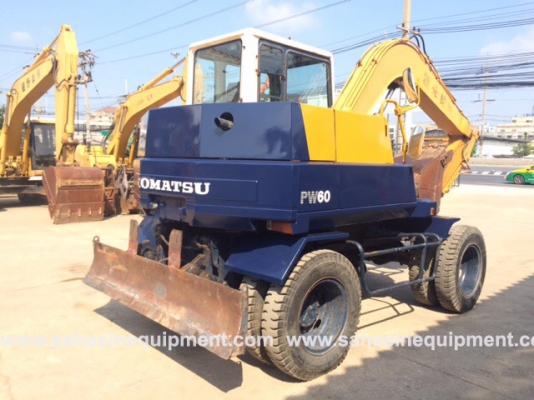รถขุดล้อยาง ยี่ห้อKOMATSU รุ่น PW60-3 S/N 023XX สภาพดี บจก.สหสินอีควิปเม้นท์ โทร.081-5851880, 02-5168100-1 www.sahasinequipment.com รถขุดล้อยาง ยี่ห้อKOMATSU รุ่น PW60-3 S/N 023XX สภาพดี บจก.สหสินอีควิปเม้นท์ โทร.081-5851880, 02-5168100-1 www.sahasinequipment.com