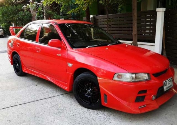 Mitsubishi lancer ท้ายเบนซ์ 1.5 ปี 97 สีแดงสด รถแต่งสวย ขับสนุก วิ่งน้ำมันอย่างเดียว