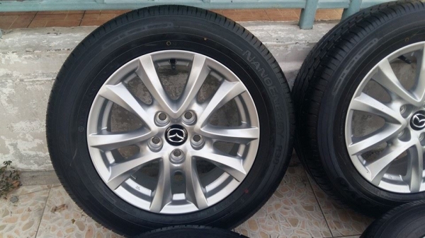 ขายล้อแม็กป้ายแดง mazda3 16"&times;6.5" et50 5รู114.3 พร้อมยาง ปี14 สนใจติดต่อเล็กคลองสามครับ 081-3747940