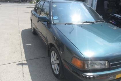 รถมาสด้า 323 1.3 สีเขียว ติดแก๊สลงเล่มแล้ว พร้อมใช้