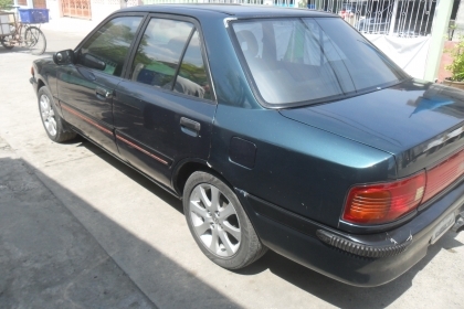 รถมาสด้า 323 1.3 สีเขียว ติดแก๊สลงเล่มแล้ว พร้อมใช้