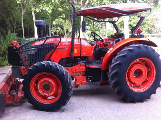 ขายรถไถ Kubota M7040 (4WD) พร้อมดันหน้า+ผานพรวนช้าง รถบ้าน เดิมๆ พร้อมใช้งานครับ