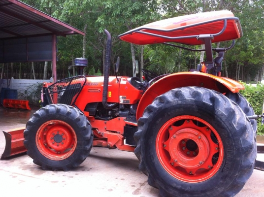 ขายรถไถ Kubota M7040 (4WD) พร้อมดันหน้า+ผานพรวนช้าง รถบ้าน เดิมๆ พร้อมใช้งานครับ