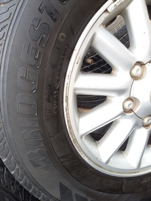 ขายล้อISUZU ขอบ15 12ก้านพร้อมยาง215/70/15  4 ล้อ