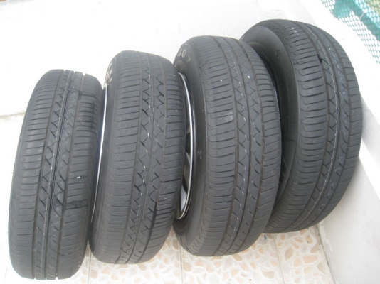 ขายกะทะล้อ Nissan march 14" 4รู 100 +ฝาครอบ+ ยาง ปี 4812 (081-3747940)