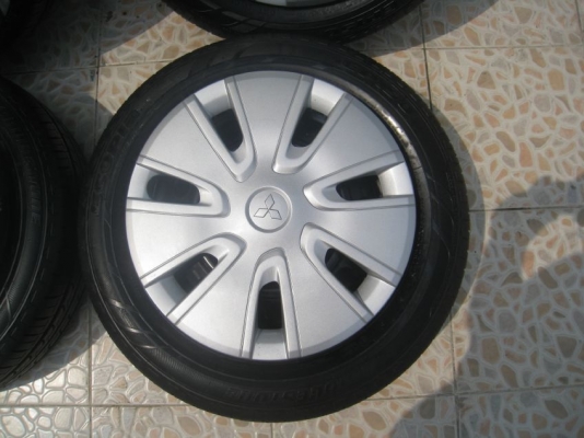 ขายกะทะล้อ Mitsubishi mirage ขอบ14 4รู100 + ฝาครอบ+ยางปี 12 (081-3747940)