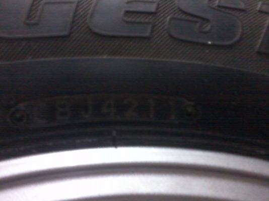 ขายแม็กอะไหล่ขอบ16พร้อมยาง215-65บิสโตนปี11