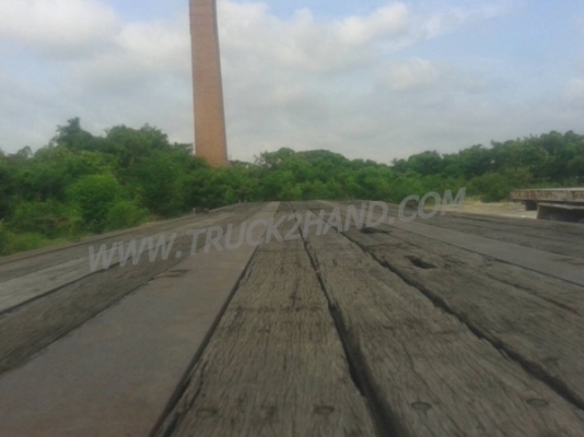 หางพื้นเรียบยาว 12 เมตร ต่ออู่พนัส จดทะเบียนปี 46 เลขคัชซี P36-1296 แบบรุ่น PS2-SC1200A น๊อต 8 ตัว ยาง 10.00-20 / 2 เพลา