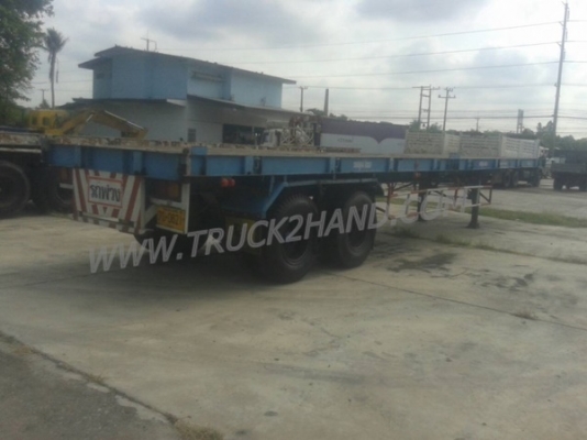 หางพื้นเรียบยาว 12 เมตร ต่ออู่พนัส จดทะเบียนปี 46 เลขคัชซี P36-1296 แบบรุ่น PS2-SC1200A น๊อต 8 ตัว ยาง 10.00-20 / 2 เพลา