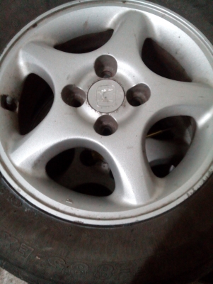 ขายแม็กพร้อมยาง ขอบ14 ฮออนด้าครับถูกๆๆๆๆๆ4รู100