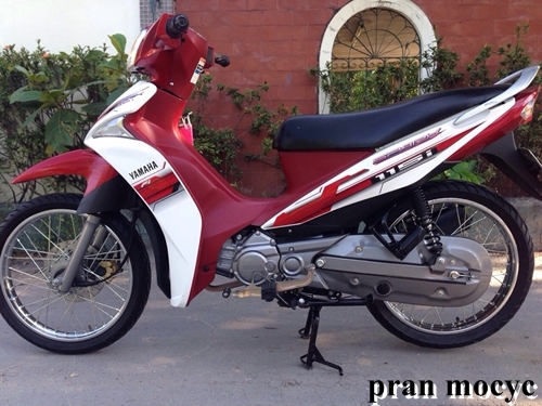 spark115iสีขาวเเดง สตาร์ทเท้า ปี2557