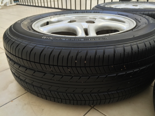 ขายล้อแม็กพร้อมยาง HONDA ขอบ15 4รู100 ชุดละ3200บาท ขายล้อแม็กพร้อมยาง HONDA ขอบ15 4รู100 ชุดละ3200บาท