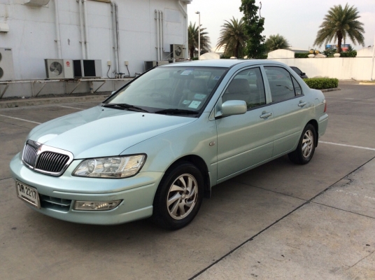 ขายรถ มิตซู Lancer  Cedia 1.8 se.i Limited ปี01ต้วท็อป ออโต้ ไฟฟ้าทั้งคัน เบาะหนังแท้ ลายไม้ airbag2ใบ abs ภายในสวยสะอาด แอร์เย็นฉ่ำ ตัวถังบางเดิมสวยมาก ไม่มีชนเลย สีเงาบางสวย เครื่องดี เกียร์ดี ช่วงล่างดีมาก รถขับดีมาก วิ่งน้อย ไมล์แท้ รถมือเดียวจากป้ายแ