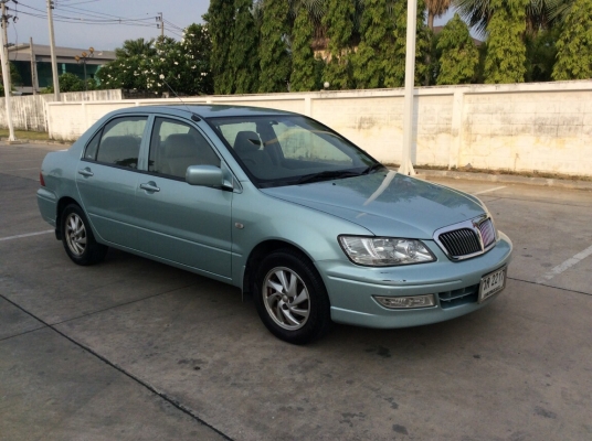 ขายรถ มิตซู Lancer  Cedia 1.8 se.i Limited ปี01ต้วท็อป ออโต้ ไฟฟ้าทั้งคัน เบาะหนังแท้ ลายไม้ airbag2ใบ abs ภายในสวยสะอาด แอร์เย็นฉ่ำ ตัวถังบางเดิมสวยมาก ไม่มีชนเลย สีเงาบางสวย เครื่องดี เกียร์ดี ช่วงล่างดีมาก รถขับดีมาก วิ่งน้อย ไมล์แท้ รถมือเดียวจากป้ายแ
