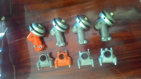 ขายถูกอะไหล่เครื่องตัดหญ้า หัวเกียร์และประกับยึดมือจับ ยังไม่เคยใช้งาน